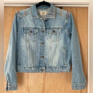 Marine Layer Jean jacked with embroidered sun design- size Medium